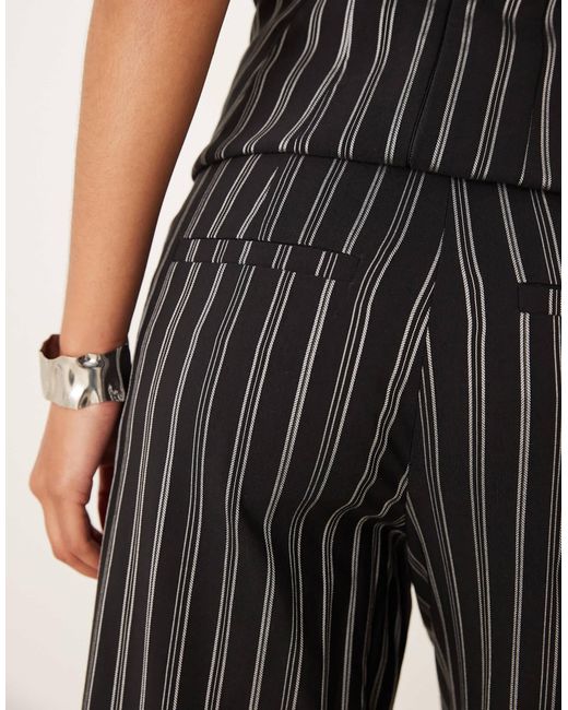 Pantalon d'ensemble évasé et ajusté à rayures - noir et blanc ASOS en coloris Natural