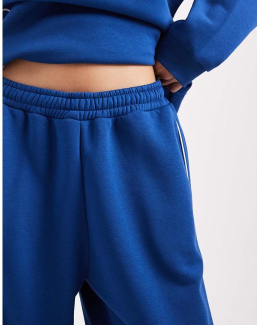 Pantalon Collusion en coloris Blue