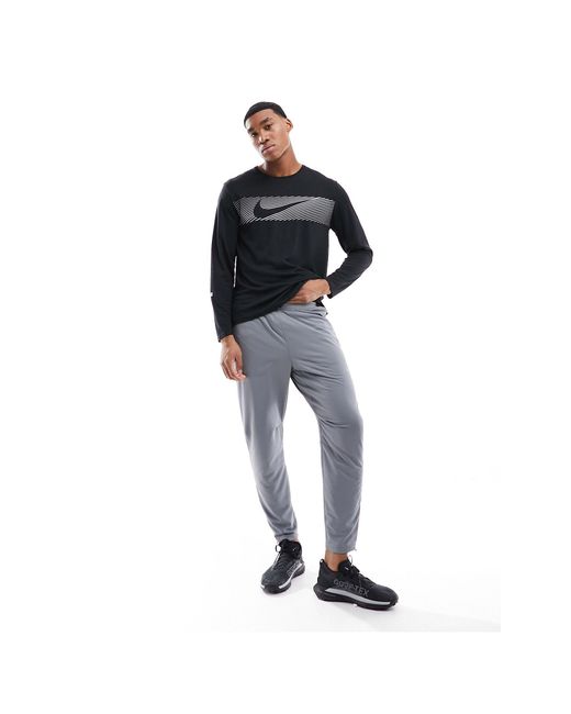 Miler - t-shirt manches longues en tissu dri-fit Nike pour homme en coloris Black