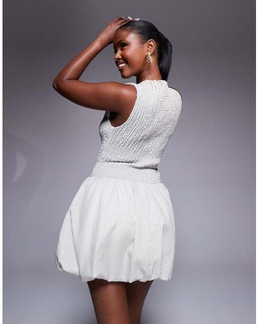 open lace back dress Karenza Bubble Hem Mini Dress White main image 1