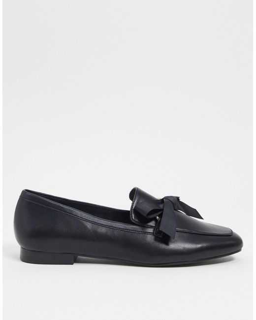 Sandalias con detalle de lazo de Ferragamo de color Negro sandalias y chanclas de Sandalias planas Mujer Zapatos de Zapatos planos 