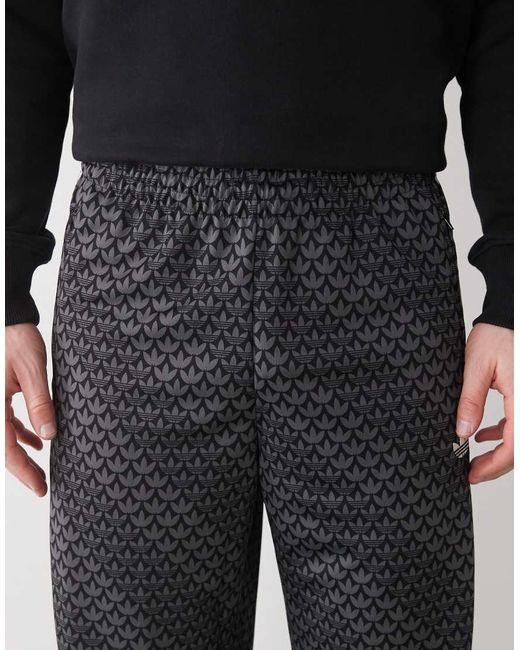 adidas Originals Firebird Loose Monogram Track Pants in Black for Men ...