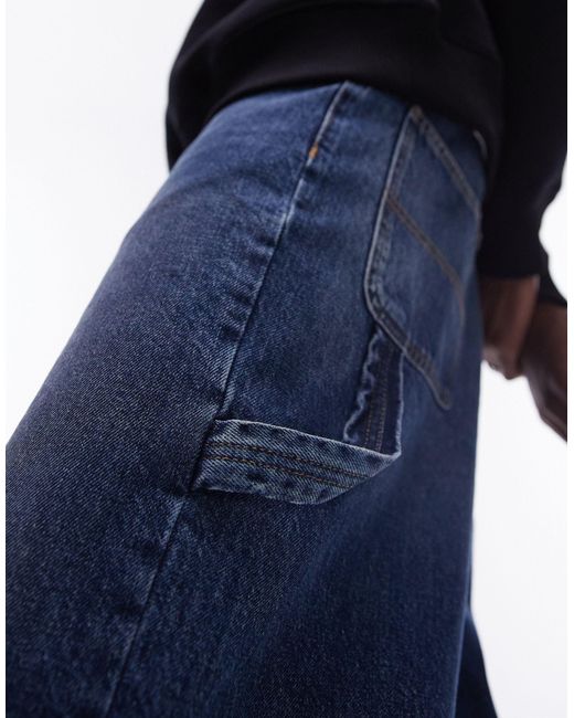 Pantaloncini di jeans taglio lungo lavaggio scuro di Topman in Blue da Uomo