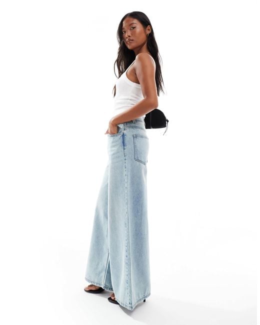 Asos design petite - jean ample à taille haute - délavage vintage ASOS en coloris Blue