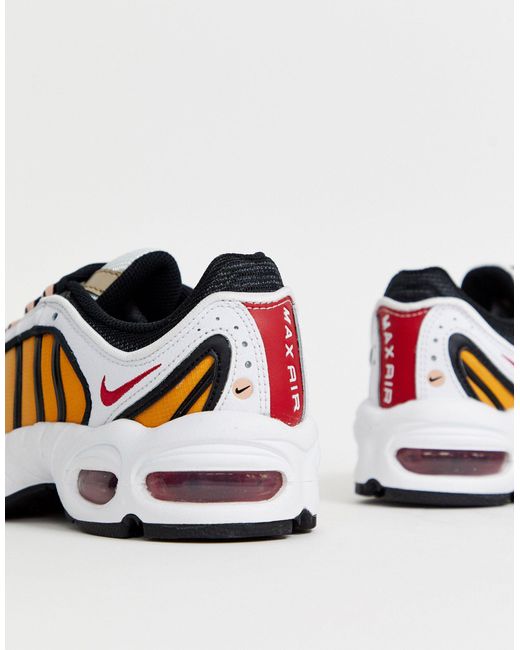 nike tailwind orange