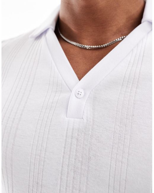 ASOS – körperbetontes, geripptes polohemd in White für Herren