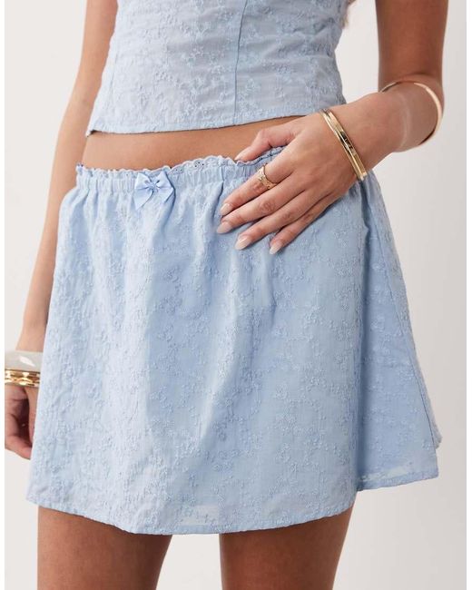 The Frolic Blue Exclusive Cotton Bow Detail Frill Mini Skirt