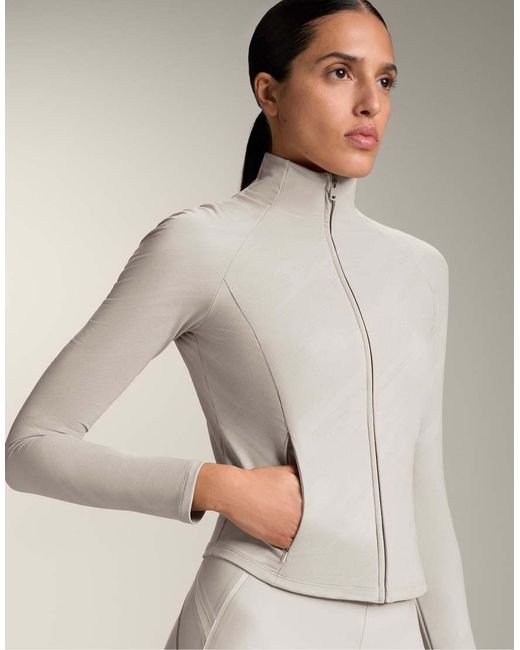 Oysho Natural Light Warm Reflective Technical Jacket