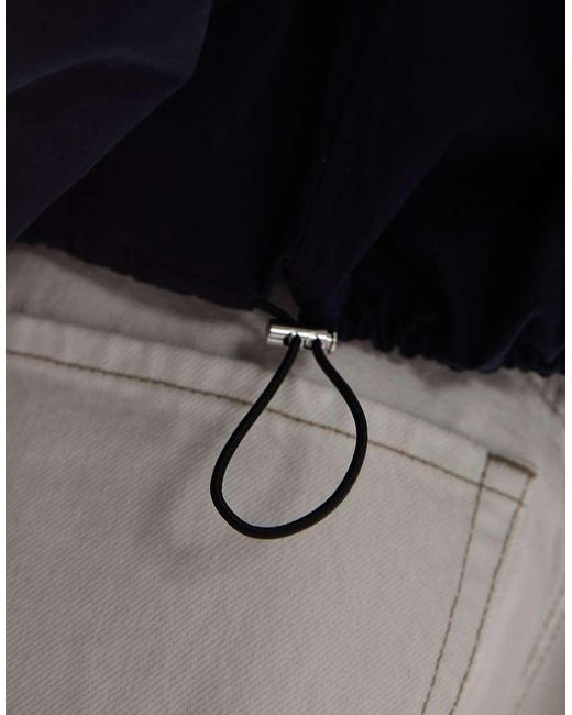 Chaqueta Marino Voluminosa Con Bajo Abullonado Con Cordón Ajustable De Tejido De Algodón Puro De ARKET de color Blue