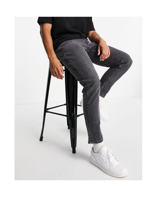 SELECTED – schmal zulaufende baumwoll-jeans in Black für Herren
