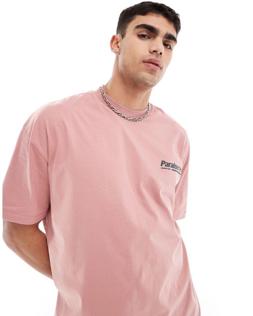 Camiseta extragrande con estampado deportivo ASOS de hombre de color Pink