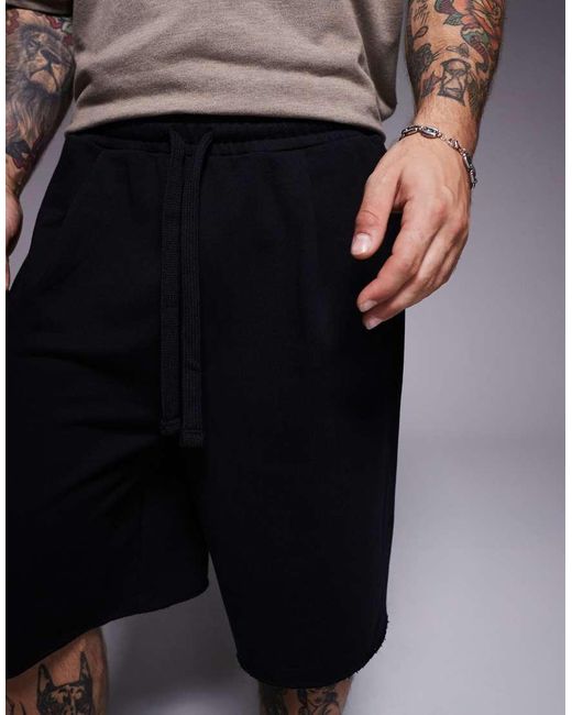 Pantalones Cortos Negros De Corte Alargado Extragrande De ASOS de hombre de color Black