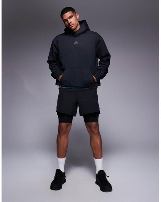 Adidas Originals Blue Adidas Training Strength Oversized Hoodie for men