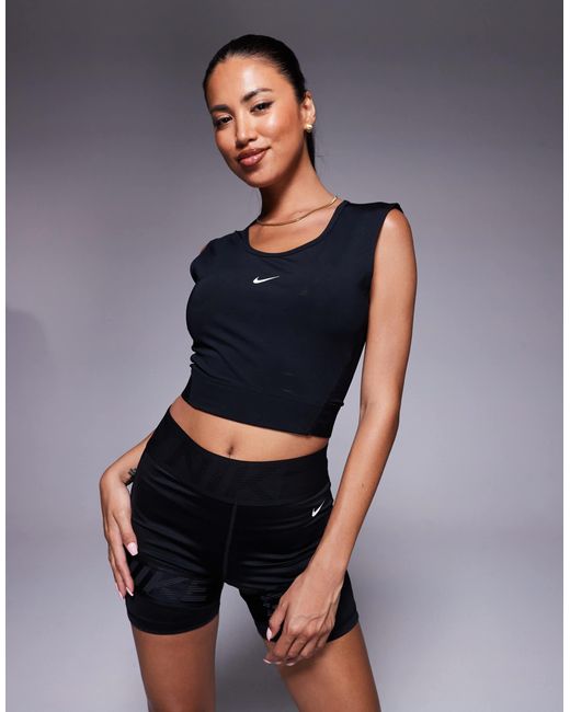 Pro - débardeur court en tissu dri-fit Nike en coloris Blue