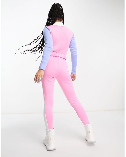 Petite - tuta jumpsuit da sci pastello con cintura di Threadbare in Pink