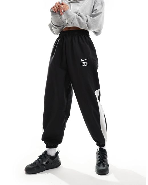Trend - pantalon Nike en coloris Black