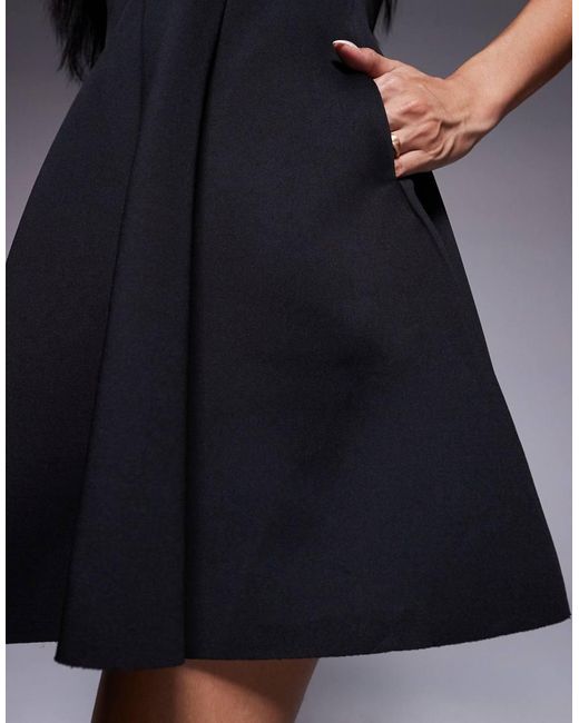 Goddiva Black Cap Sleeve Plunging V Neckline Skater Mini Dress