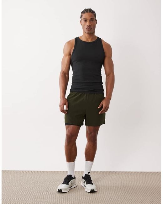 4505 Black Icon Seamless Ribbed Slim Fit Tank Top for men