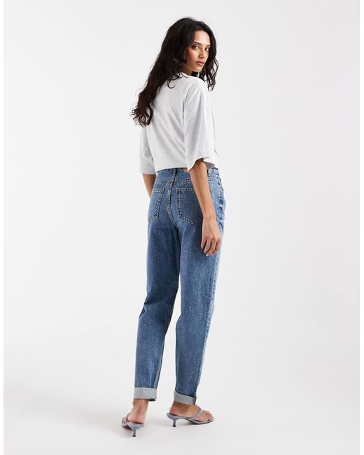 Vaqueros Mom Holgados De Talle Alto De ASOS de color Blue