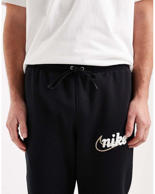 Nike Black Club Joggers With Swoosh Detail for men