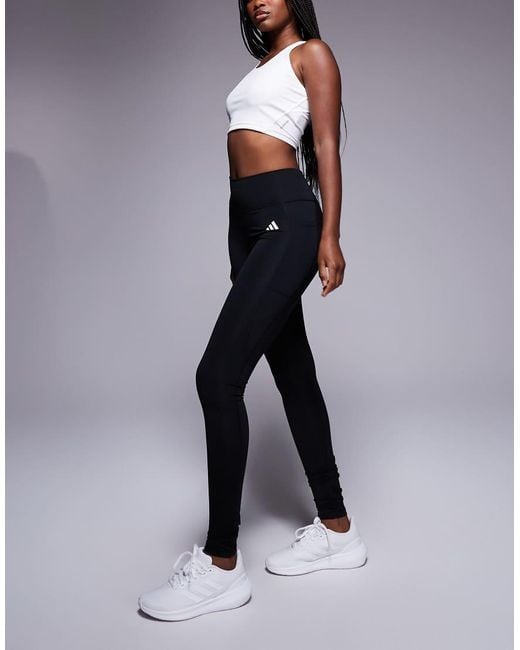 Adidas Originals Blue Adidas Training Essentials leggings With Phone Pocket