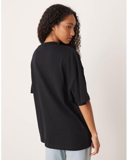 T-shirt oversize à imprimé pomme d'amour ASOS en coloris Black