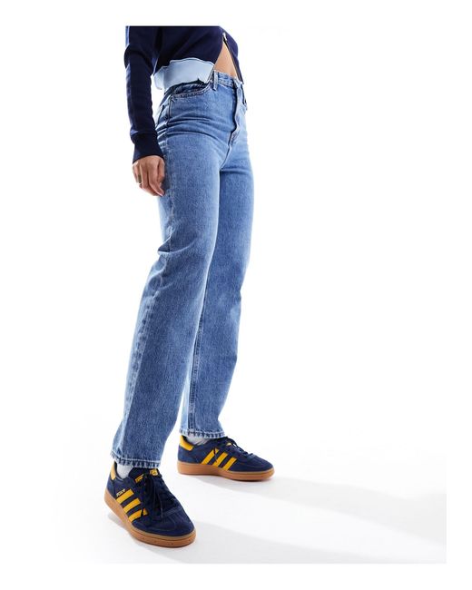 Julie - jeans dritti a vita super alta lavaggio medio di Tommy Hilfiger in Blue