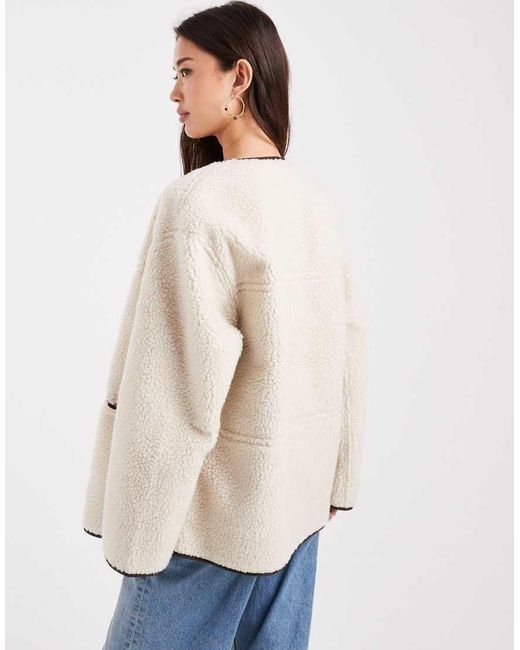 Chaqueta Reversible Color Crema Y Marrón De Cuero Sintético Y Borreguito Tipo Peluche De Pieces de color Blue