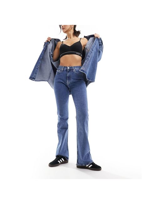 Jean bootcut authentique - moyen délavé Calvin Klein en coloris Blue