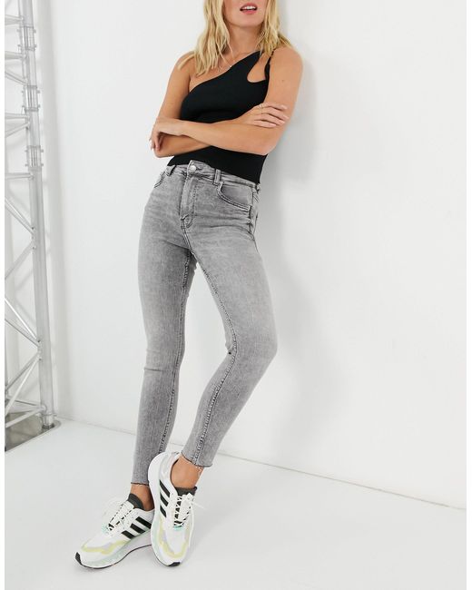 Jeans skinny a vita alta slavatoBershka in Denim di colore Grigio | Lyst