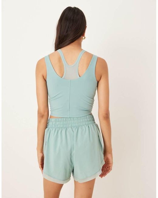 Top De Tirantes Con Diseño Superpuesto Dri-Fit De Nike One Training Nike de color Blue