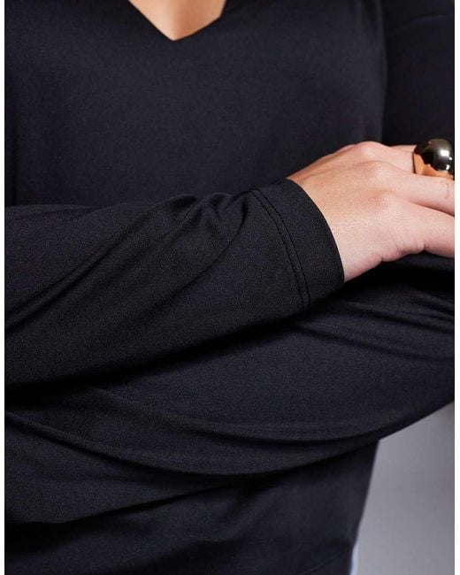 Top De Manga Larga Con Cuello De Pico Pronunciado De Tejido Doble De Asos Design Curve ASOS de color Black