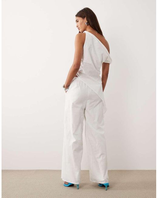 BRONZE SNAKE Natural Tasi Off Shoulder Asymetric Top And Trouser Set