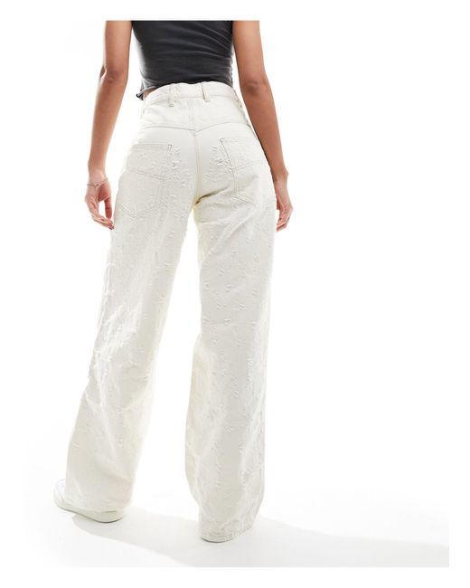 X015 - jeans super baggy a vita bassa bianco sporco con strappi di Collusion in White