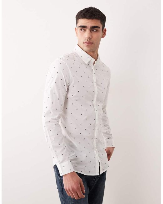 ARMANI EXCHANGE White All Over Logo Shirt Logo for men