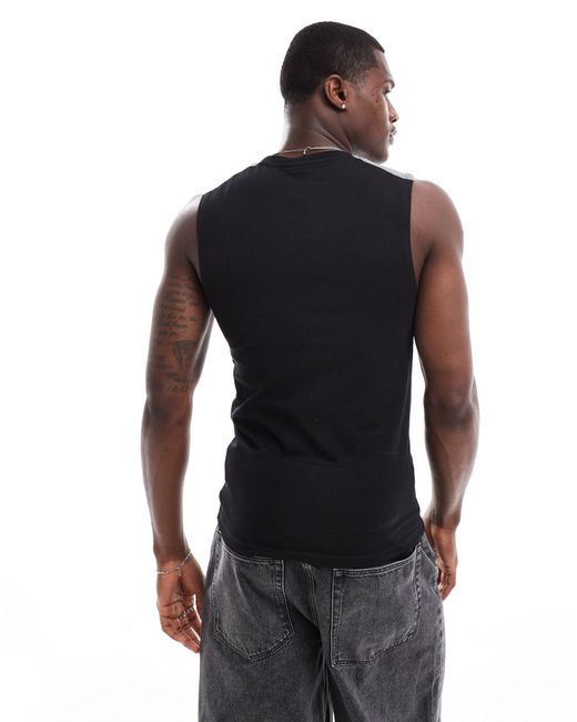 Camiseta negra ajustada sin mangas con estampado ASOS de hombre de color Blue