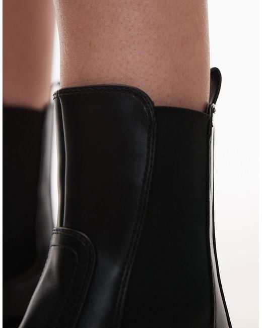 Bottines à semelle chunky Mango en coloris Black
