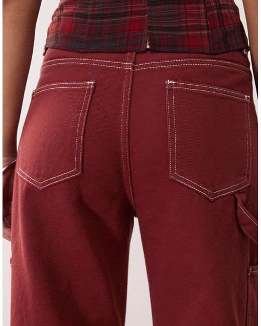 Miami vice - jean d'ensemble ample avec taille basse et poches multiples - bordeaux Lioness en coloris Red