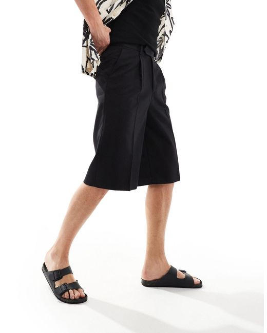 Pantaloncini eleganti ampi taglio lungo neri di ASOS in Black da Uomo