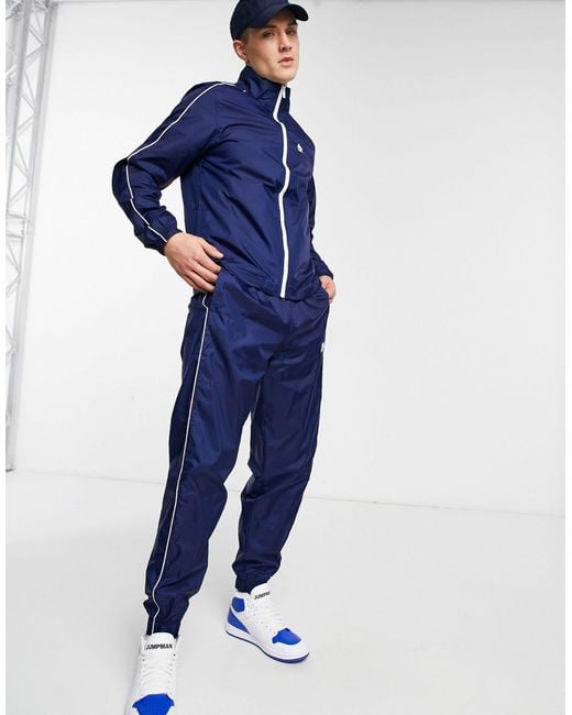 Survêtement tissé - bleu Nike pour homme en coloris Blue