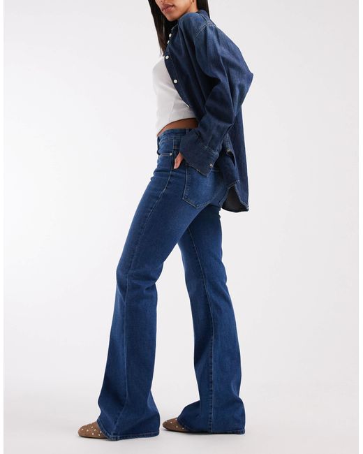 Henni - jean rétro évasé à taille haute - moyen délavé ONLY en coloris Blue