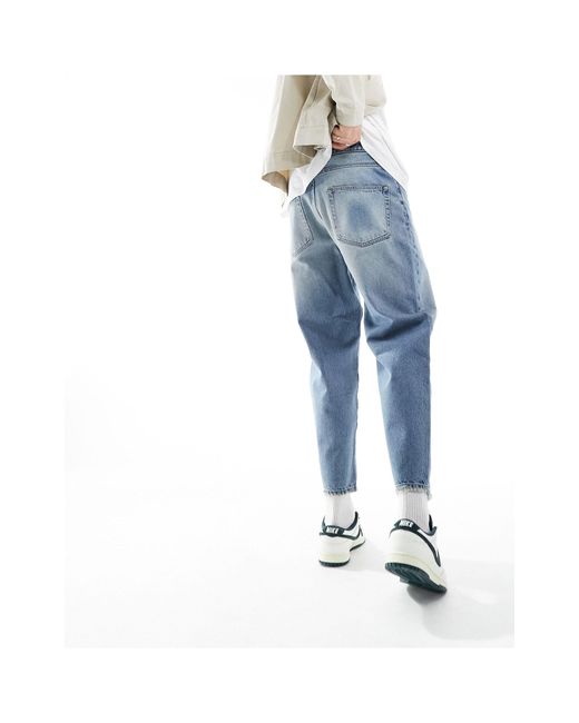 Jeans affusolati lavaggio chiaro di ASOS in Blue da Uomo