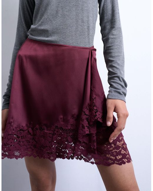 Mini-jupe asymétrique en satin avec bord en dentelle - port royale TOPSHOP en coloris Purple
