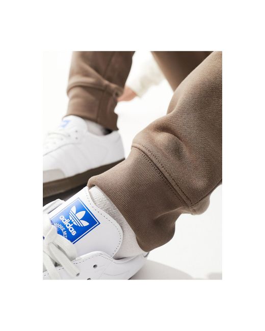 Adidas Originals White Essentials Trackies for men
