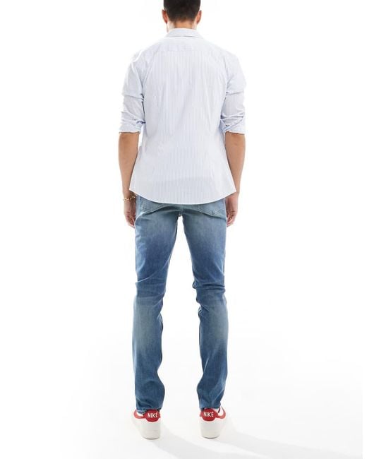 ASOS Blue Skinny Jeans With Green Tint for men