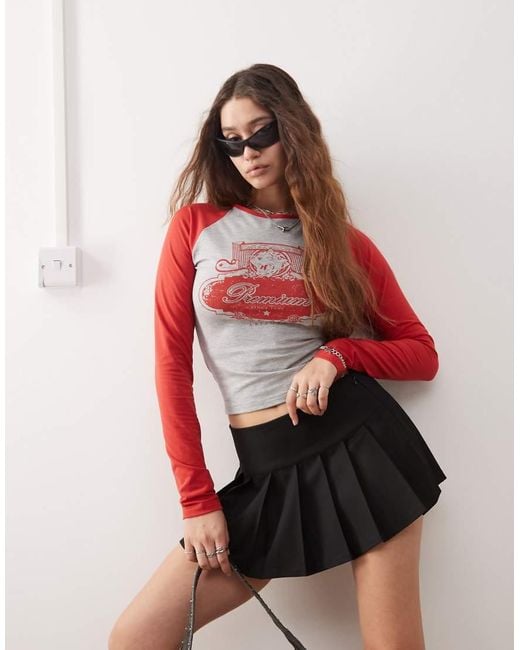 Black and pink pleated mini skirt hotsell