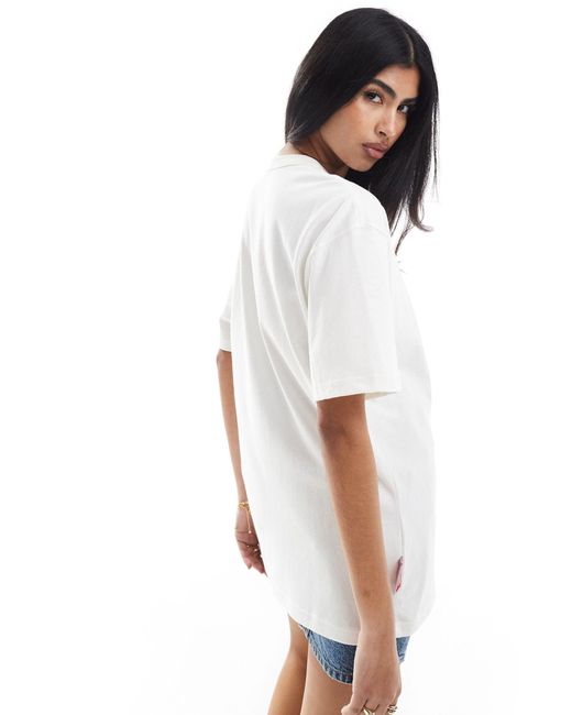 T-shirt unisex bianca con stampa grafica artistica multicolore di Nike in White
