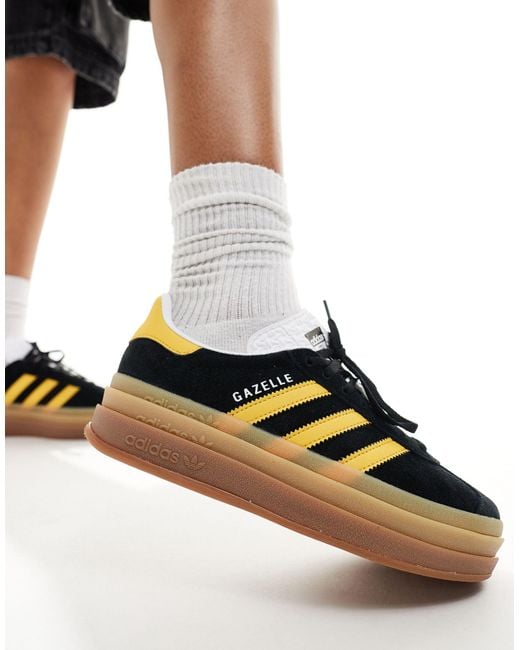 Gazelle bold - sneakers nere e oro con suola platform di Adidas Originals in Black