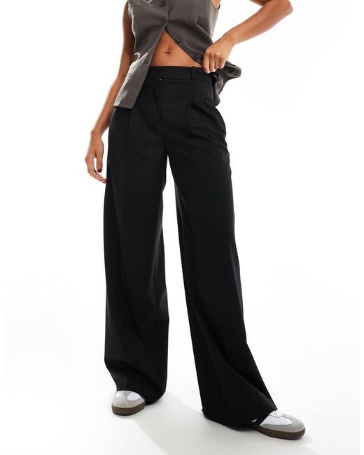 Pantalones Negros De Talle Medio Y Corte Holgado De Mango de color Black