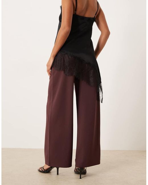 Pantaloni A Fondo Ampio Color Prugna Scuro di JDY Petite in Multicolor